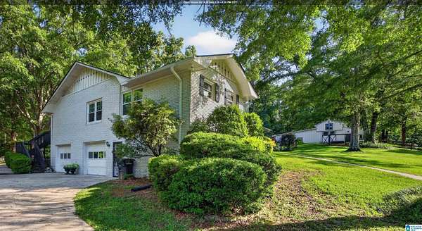 10.7 Acres of Land with Home for Sale in Columbiana, Alabama