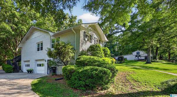 10.7 Acres of Land with Home for Sale in Columbiana, Alabama