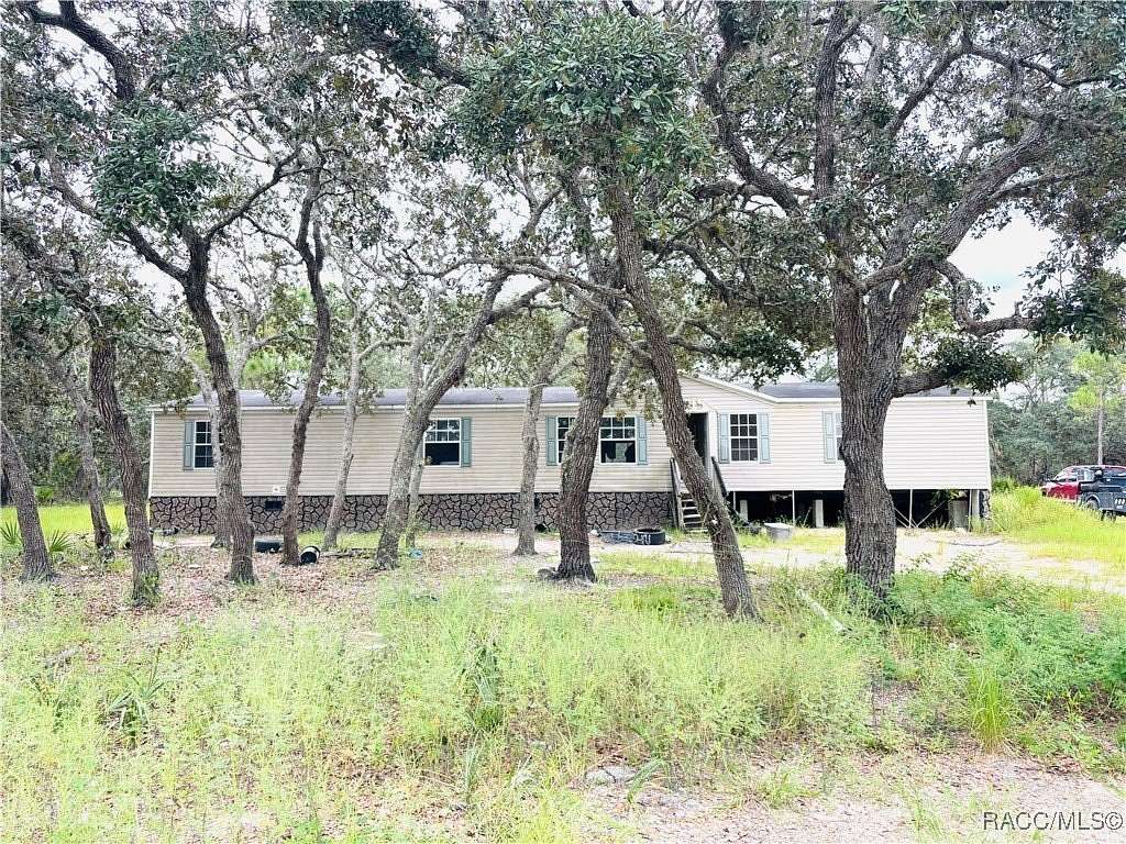 5 Acres of Residential Land with Home for Sale in Lecanto, Florida