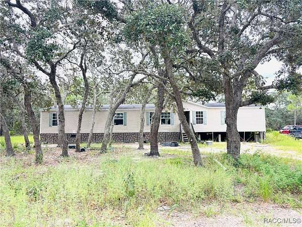 5 Acres of Residential Land with Home for Sale in Lecanto, Florida