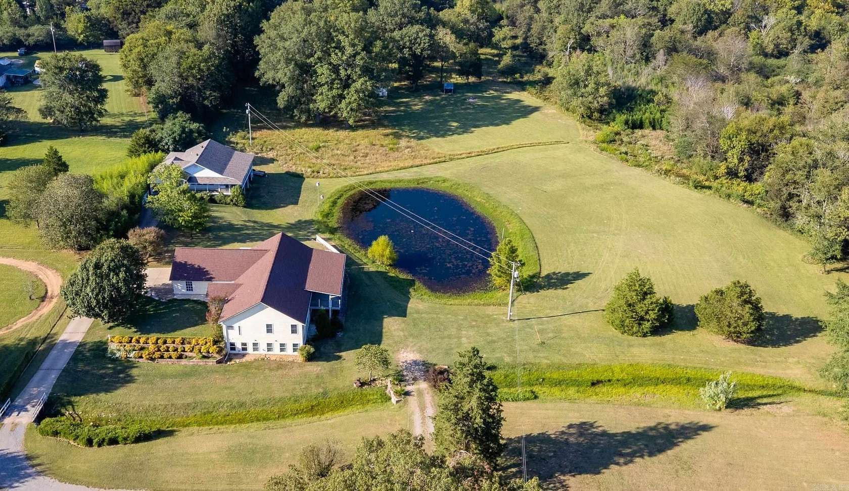 11.2 Acres of Land with Home for Sale in Benton, Arkansas