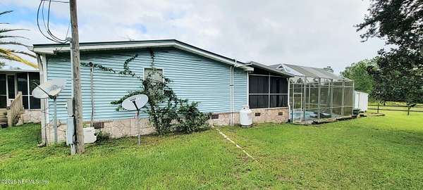 5.48 Acres of Residential Land with Home for Sale in San Mateo, Florida