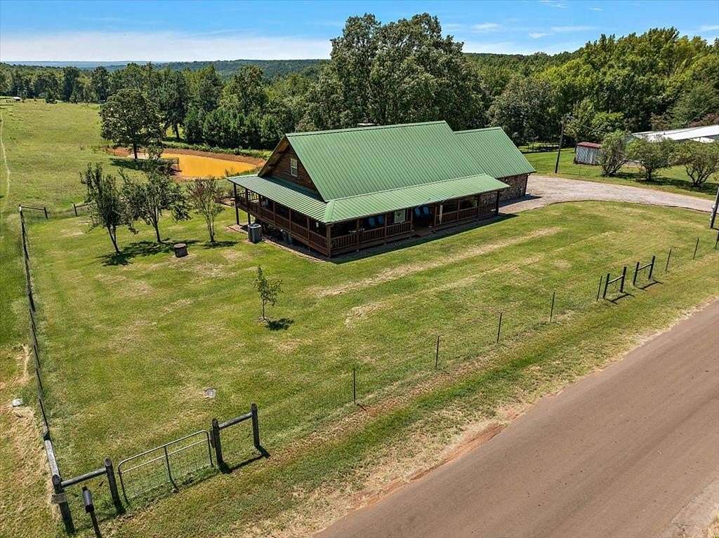 10 Acres of Residential Land with Home for Sale in Cushing, Texas