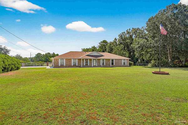 1.64 Acres of Residential Land with Home for Sale in Cantonment, Florida