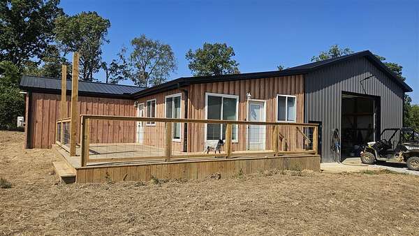 10.7 Acres of Land with Home for Sale in Summer Shade, Kentucky