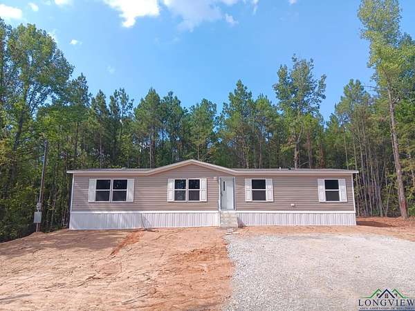 1.5 Acres of Residential Land with Home for Sale in Gilmer, Texas