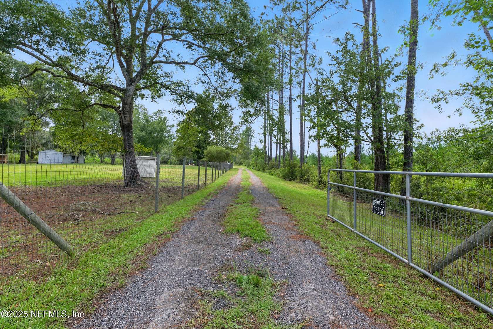 6.69 Acres of Residential Land with Home for Sale in Callahan, Florida
