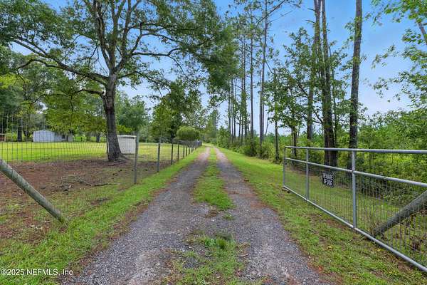 6.69 Acres of Residential Land with Home for Sale in Callahan, Florida