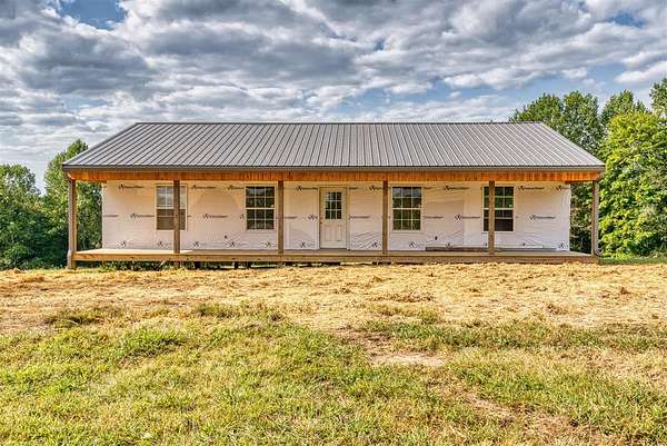 9.36 Acres of Residential Land with Home for Sale in Scottsville, Kentucky