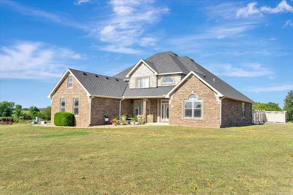 10.5 Acres of Land with Home for Sale in Bolivar, Missouri