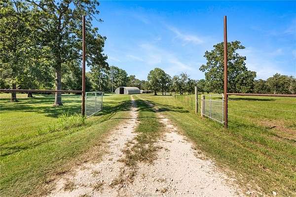 20 Acres of Land with Home for Sale in Bedias, Texas
