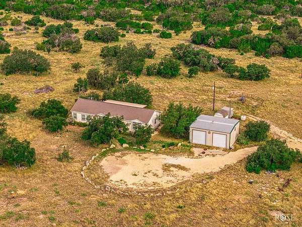 23.7 Acres of Recreational Land with Home for Sale in Sonora, Texas