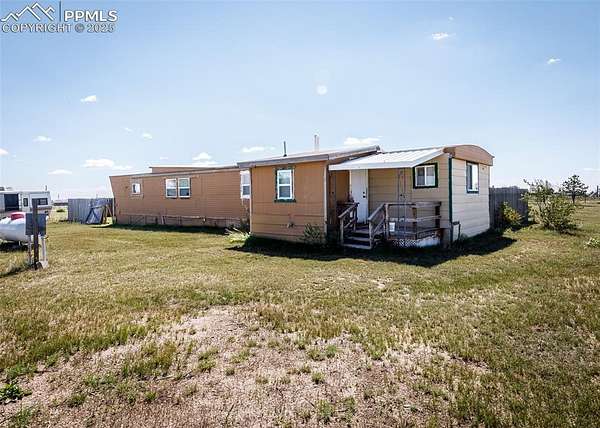 4.87 Acres of Residential Land with Home for Sale in Peyton, Colorado