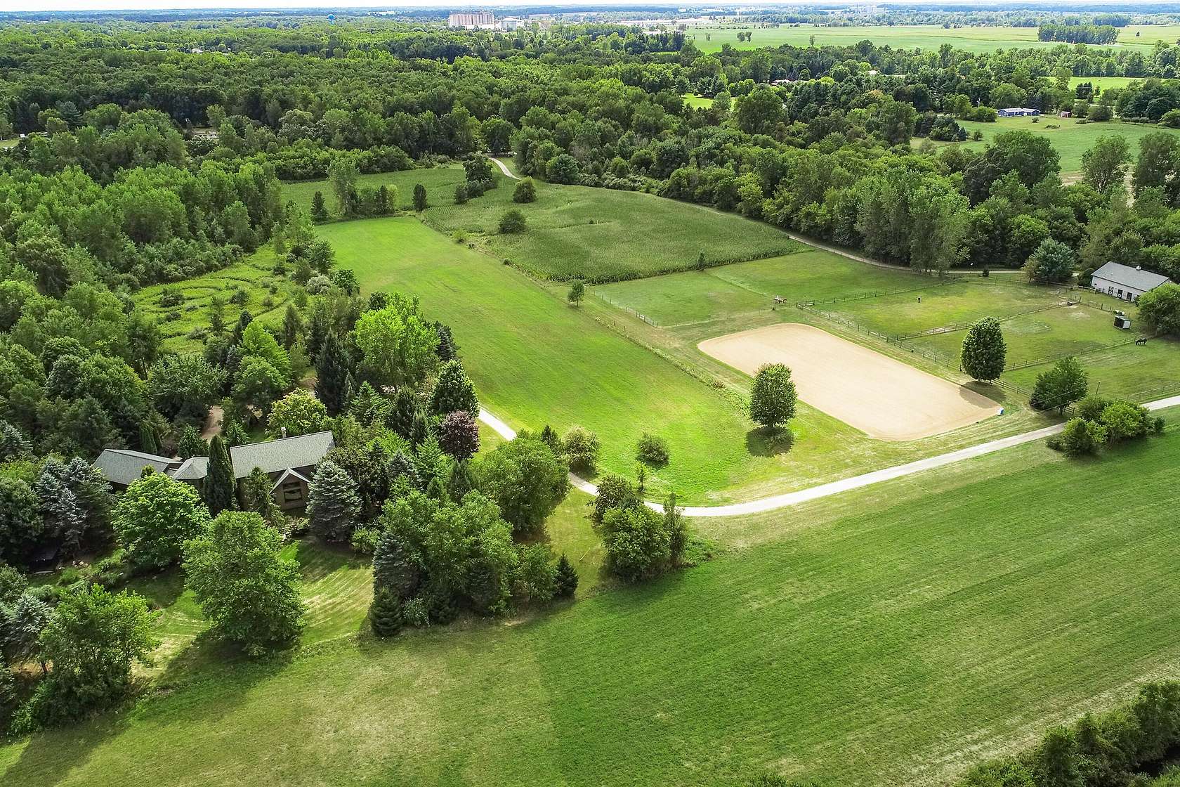 69.5 Acres of Agricultural Land with Home for Sale in Webberville, Michigan