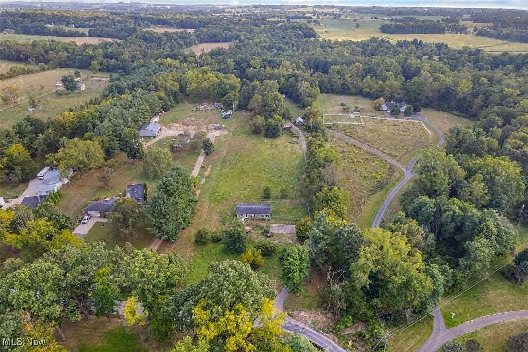 6 Acres of Residential Land with Home for Auction in Wooster, Ohio