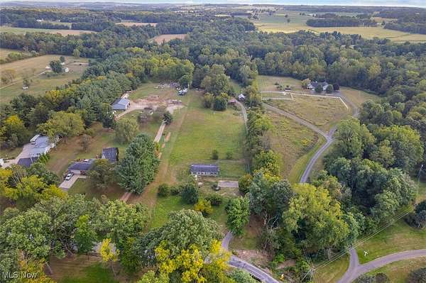 6 Acres of Residential Land with Home for Auction in Wooster, Ohio
