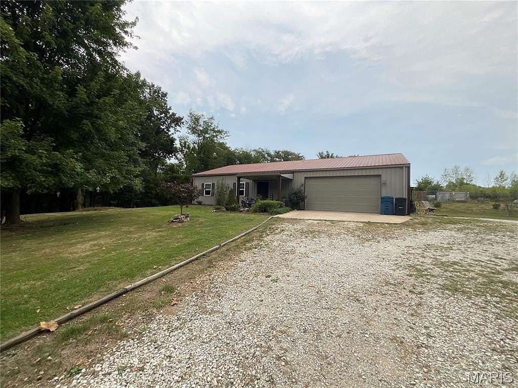5 Acres of Residential Land with Home for Sale in Taylor, Missouri