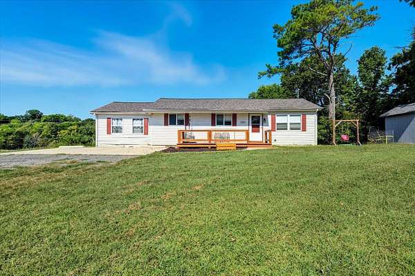2 Acres of Land with Home for Sale in Riceville, Tennessee