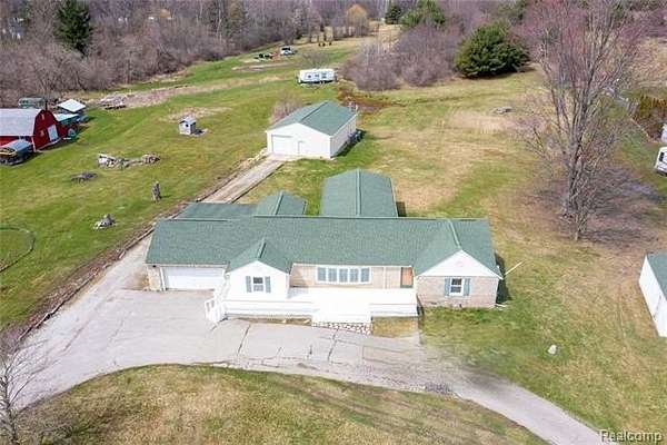 5 Acres of Residential Land with Home for Sale in St. Clair, Michigan