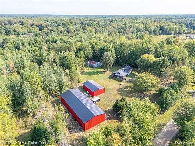 21 Acres of Land with Home for Sale in Coleman, Michigan