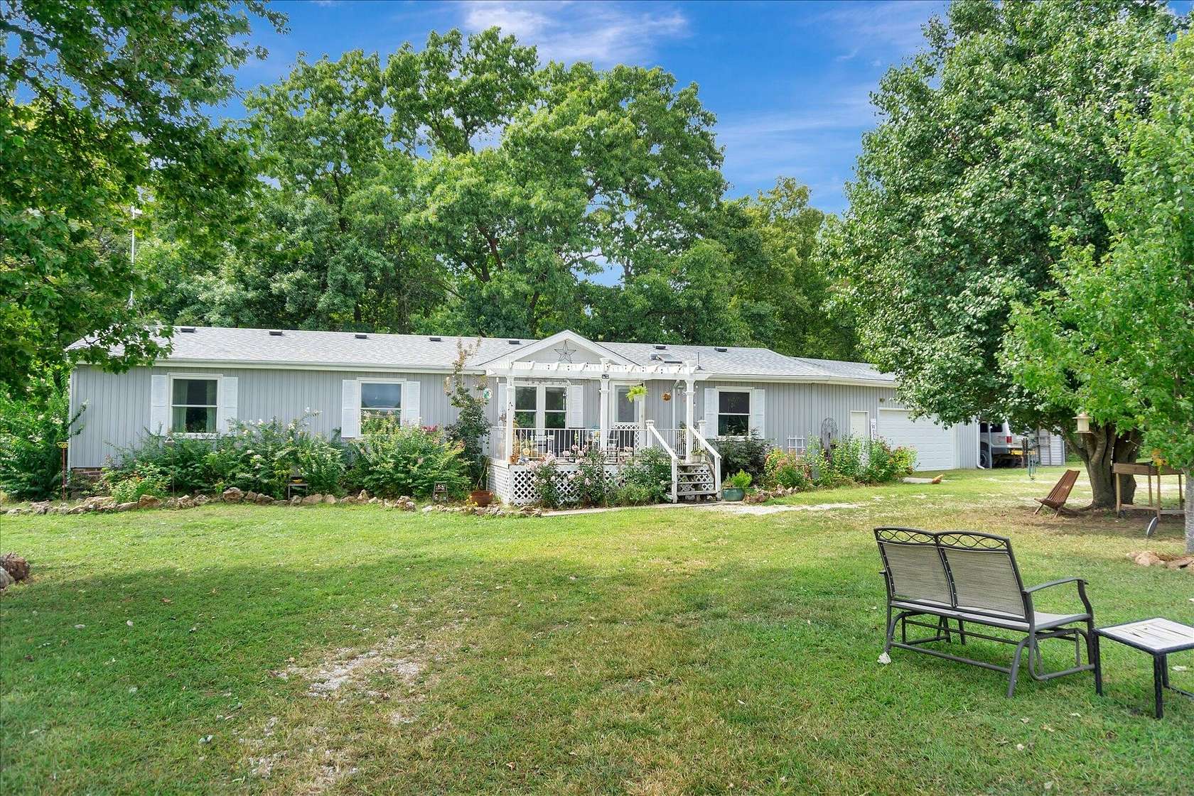 20 Acres of Land with Home for Sale in Humansville, Missouri