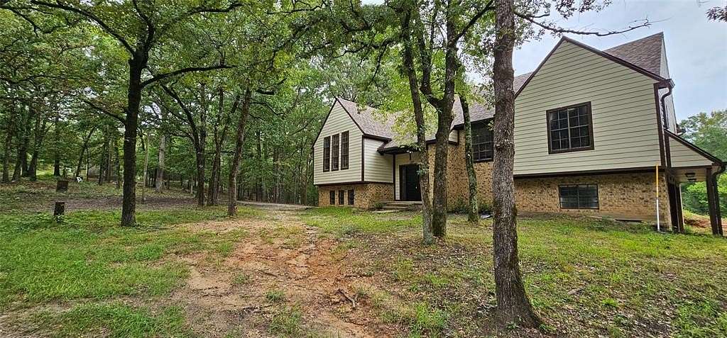 9 Acres of Residential Land with Home for Sale in Winnsboro, Texas