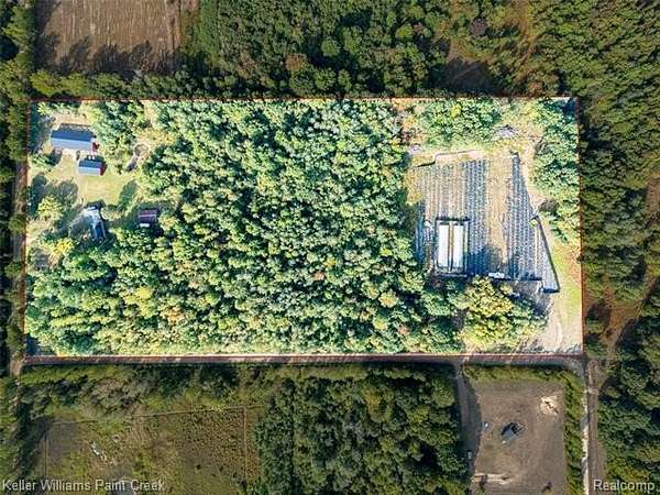 5 Acres of Improved Commercial Land for Sale in Coleman, Michigan