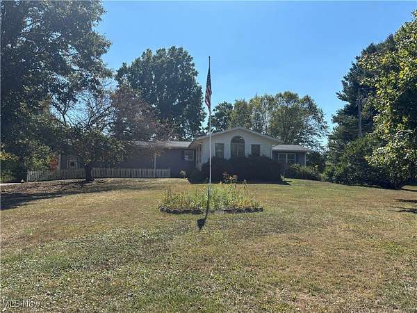 6.88 Acres of Land with Home for Sale in Mogadore, Ohio