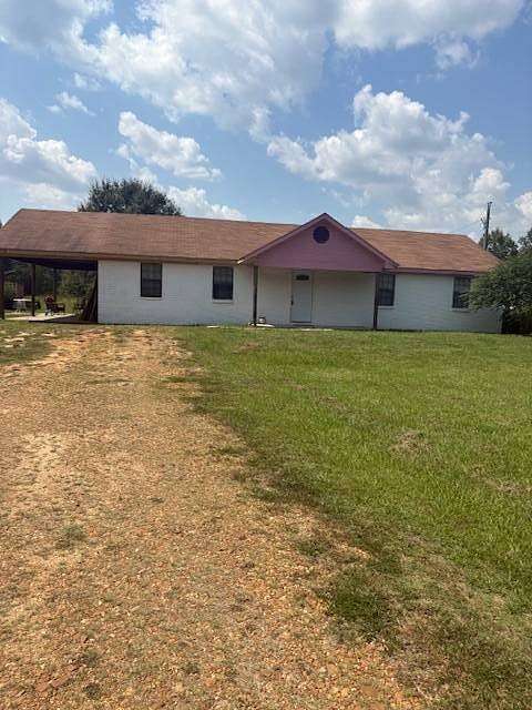 5 Acres of Residential Land with Home for Sale in Holcomb, Mississippi