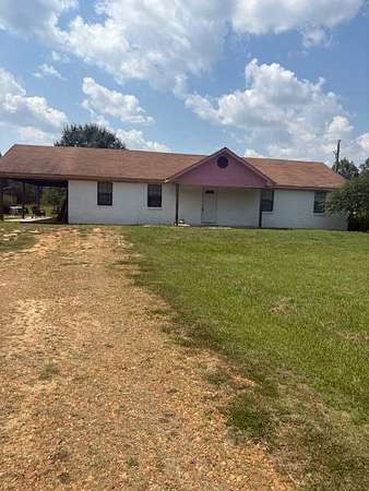 5 Acres of Residential Land with Home for Sale in Holcomb, Mississippi