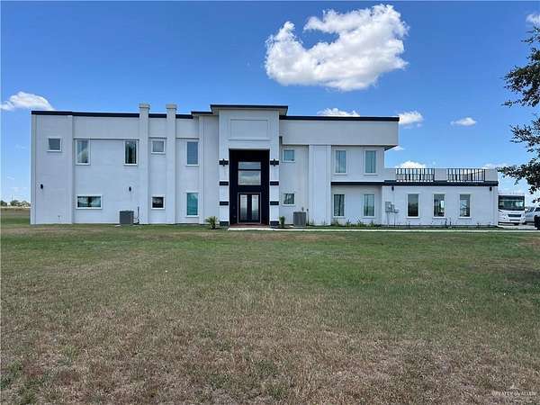 6.43 Acres of Residential Land with Home for Sale in Monte Alto, Texas