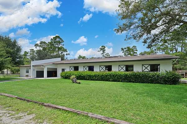 5.22 Acres of Land with Home for Lease in Loxahatchee Groves, Florida