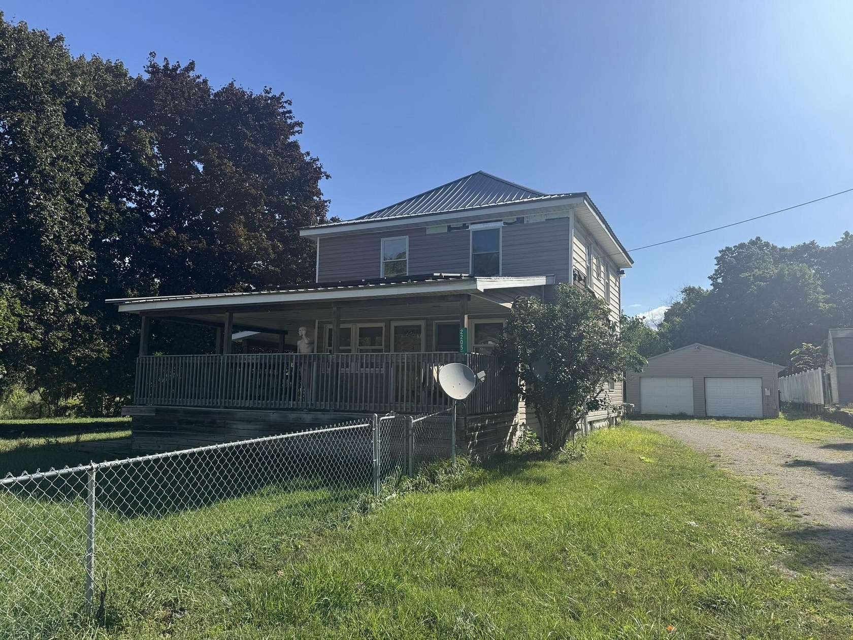 13 Acres of Land with Home for Sale in Jackson, Michigan