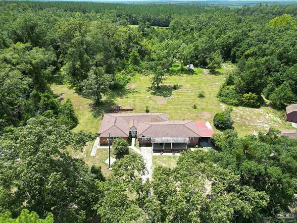 5.69 Acres of Residential Land with Home for Sale in Molino, Florida