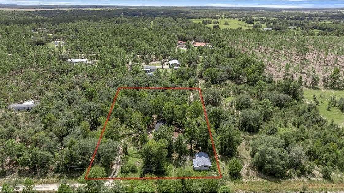 2.55 Acres of Residential Land with Home for Sale in Williston, Florida
