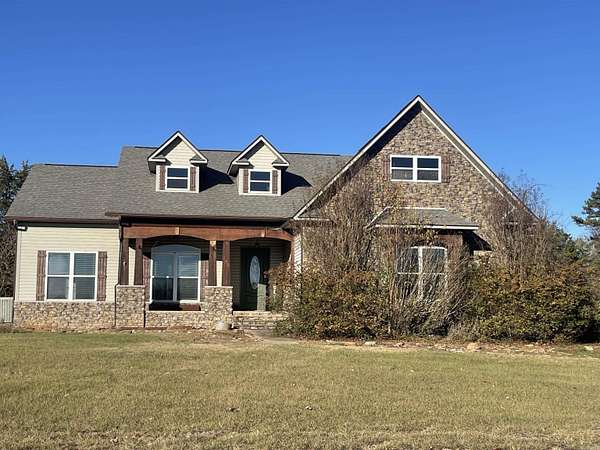 7 Acres of Residential Land with Home for Sale in Clarksville, Arkansas