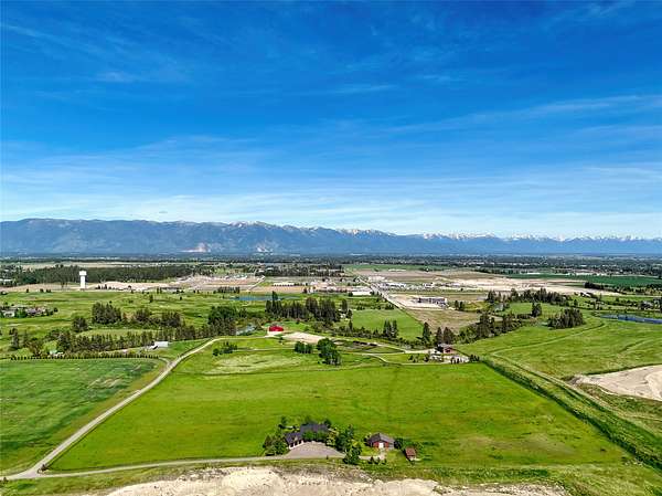 55.8 Acres of Agricultural Land with Home for Sale in Kalispell, Montana