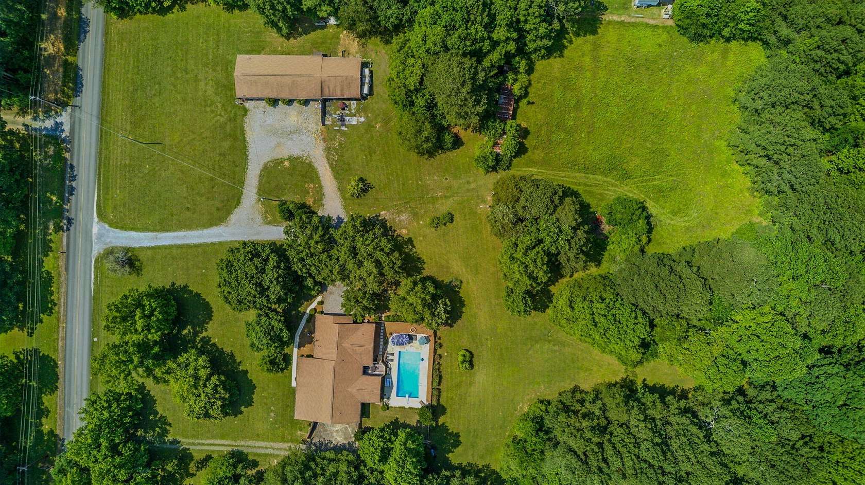 19 Acres of Land with Home for Sale in Cleveland, Tennessee