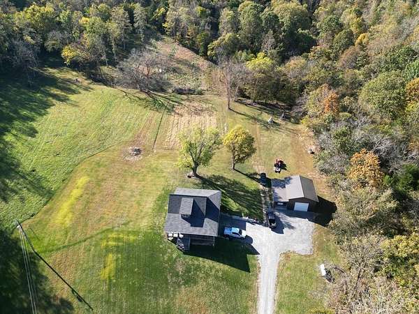 115 Acres of Agricultural Land with Home for Sale in Gainesboro, Tennessee