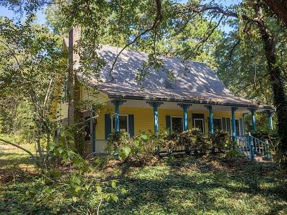 25.2 Acres of Recreational Land with Home for Sale in Palestine, Texas