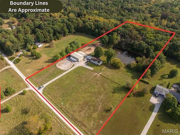 5 Acres of Residential Land with Home for Sale in Troy, Missouri