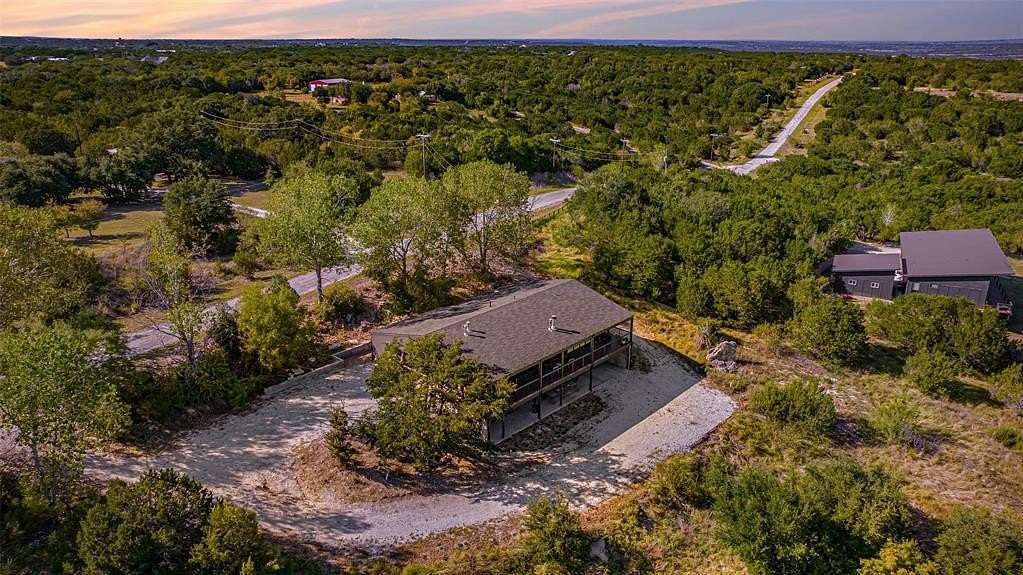 5 Acres of Residential Land with Home for Sale in Bluff Dale, Texas