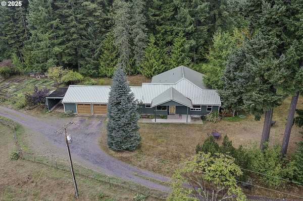 36 Acres of Land with Home for Sale in Deer Island, Oregon