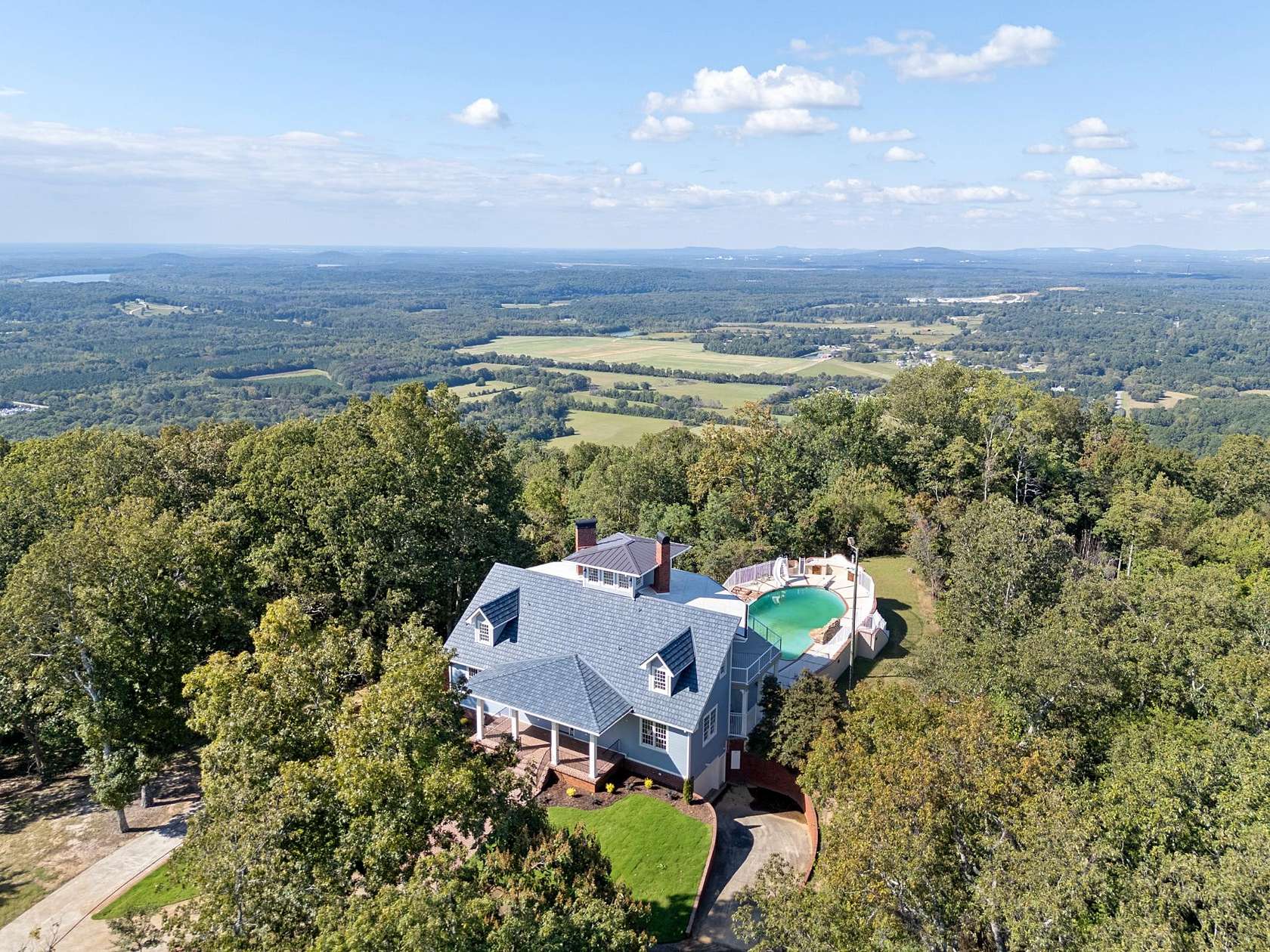 5 Acres of Land with Home for Sale in Laceys Spring, Alabama