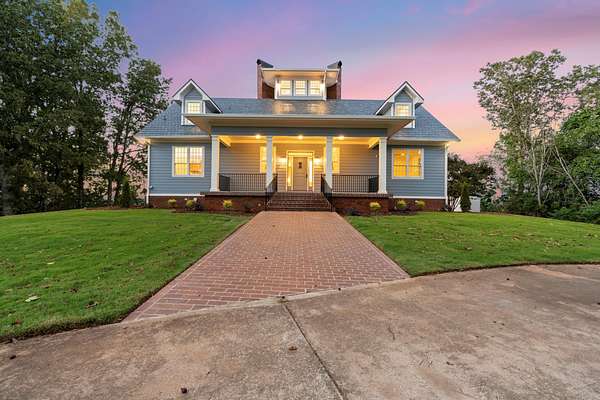 5 Acres of Residential Land with Home for Sale in Laceys Spring, Alabama