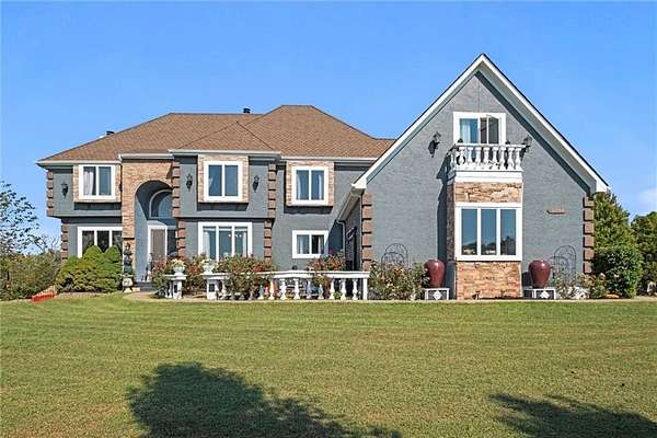 3.47 Acres of Residential Land with Home for Sale in Olathe, Kansas