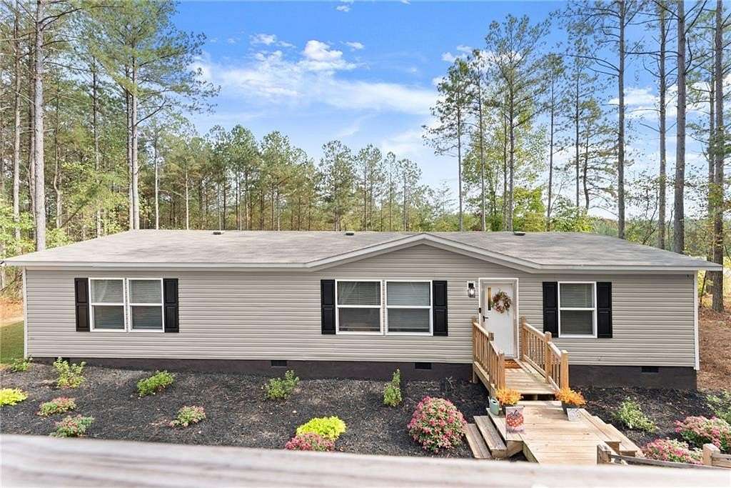 1.5 Acres of Residential Land with Home for Sale in Ball Ground, Georgia