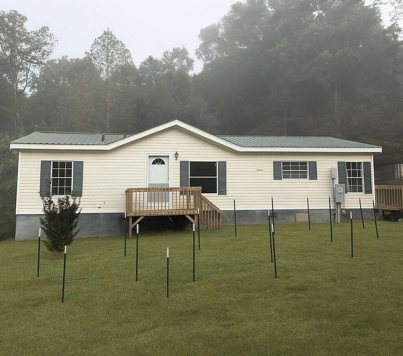 4.4 Acres of Residential Land with Home for Sale in Philadelphia, Tennessee