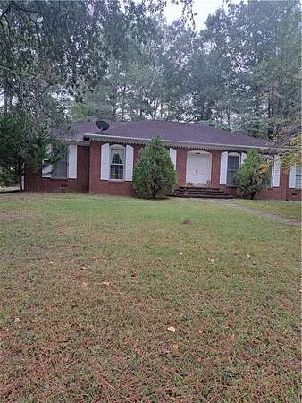 11.9 Acres of Land with Home for Sale in Powder Springs, Georgia