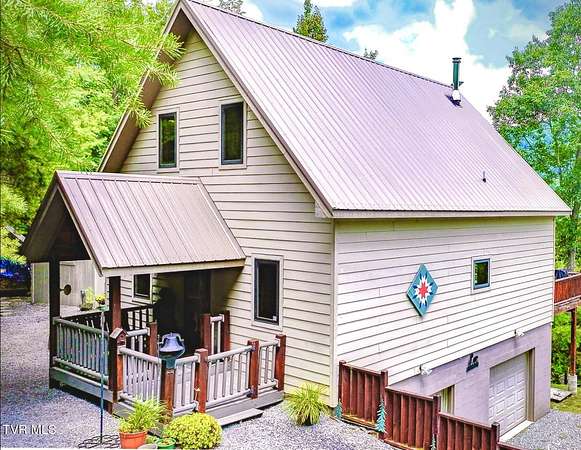 1.72 Acres of Residential Land with Home for Sale in Roan Mountain, Tennessee